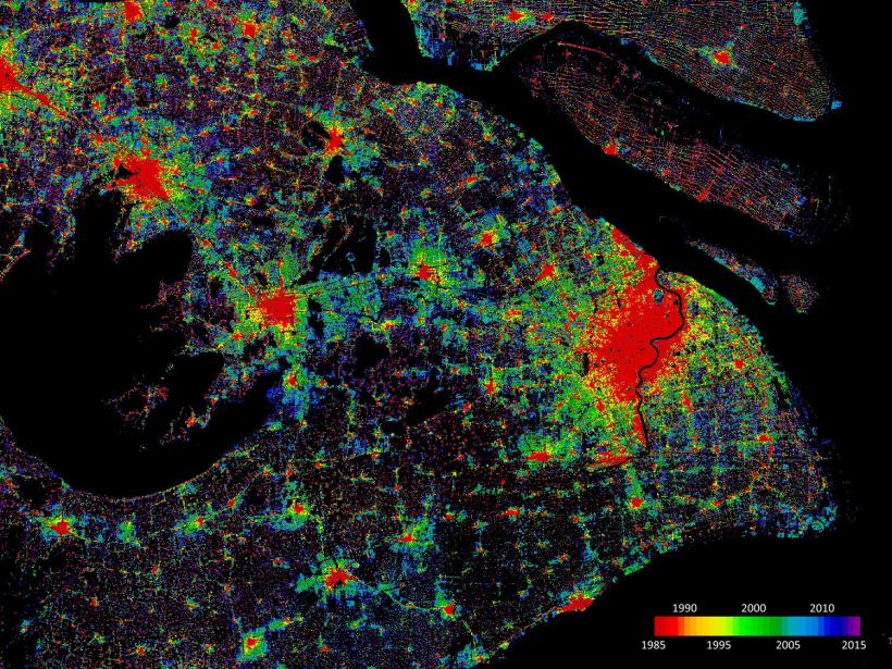 Photo Credit: ESA/WSF. Urban sprawl in Shanghai, China, 1985–2015. The satellite image highlights areas of rapid, uncontrolled demographic growth.